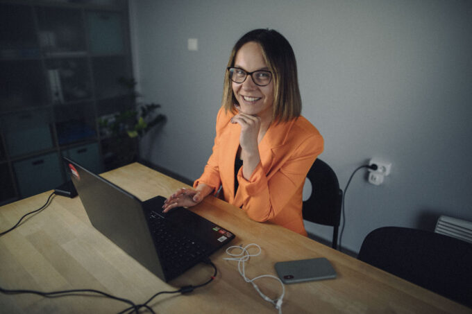 DAC.digital team member working in the office